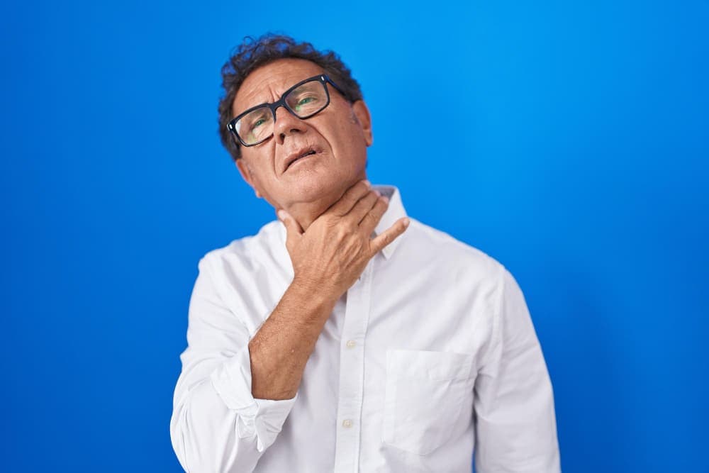Possible thyroid pain or discomfort, throat irritation, or thyroid health issues.